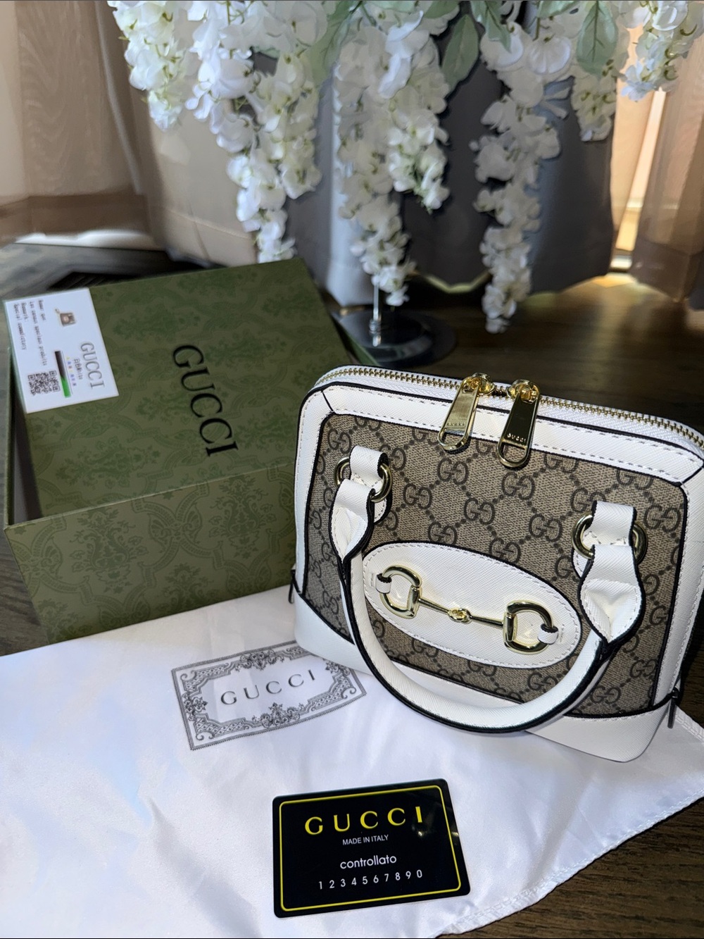 GUCCI
GG Supreme Monogram Azalea Calfskin Mini Horsebit 1955 Top Handle Bag Beig
